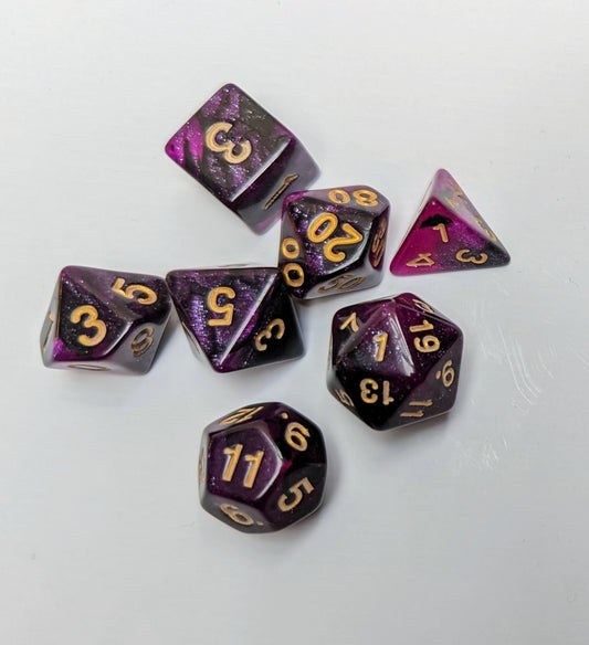 Purple and black DND dice
