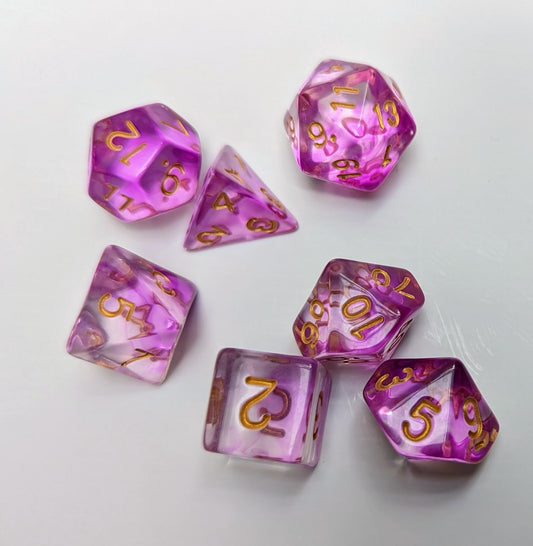 Pink and clear DND dice